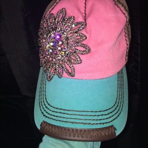 Blue, pink, and brown hat